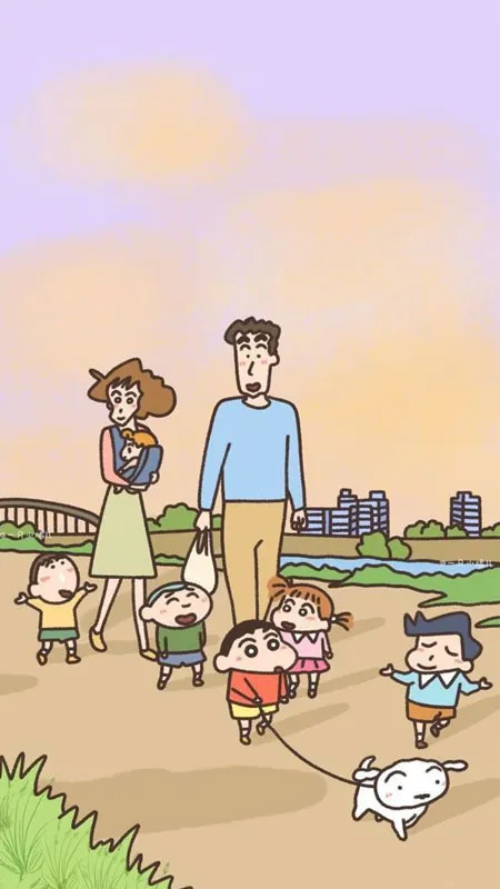 Ảnh Shin-chan cùng cả nhà đang xây lâu đài cát